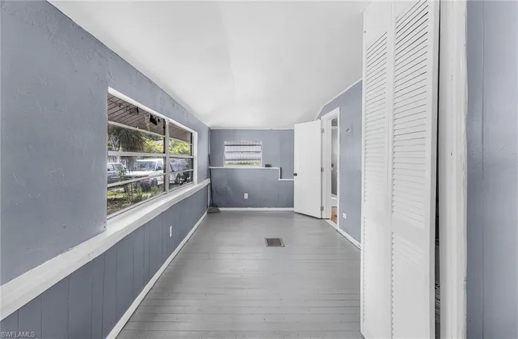 Hallway featuring hardwood / wood-style flooring