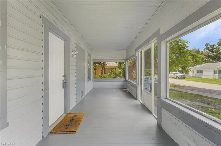 Sunroom featuring a healthy amount of sunlight