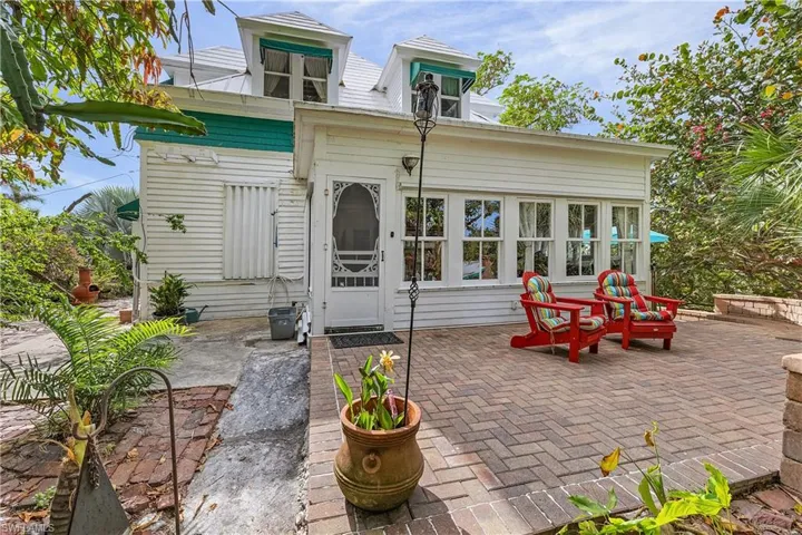 Back of house with a patio area