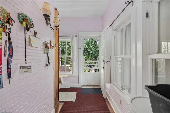 Entryway with wooden walls