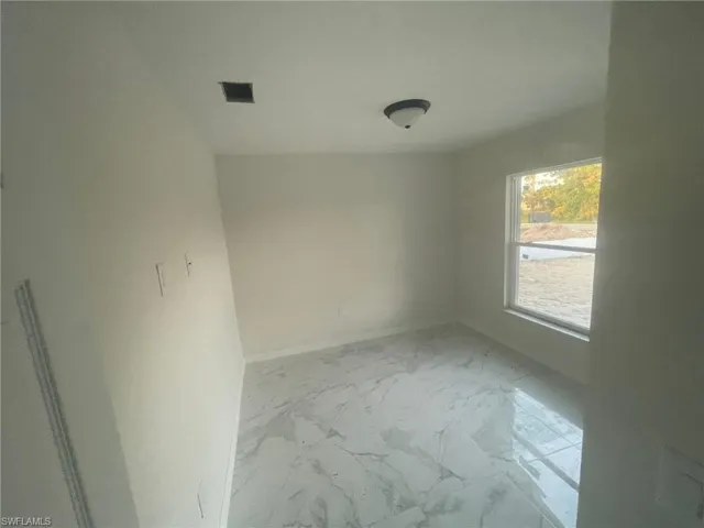 View of tiled empty room