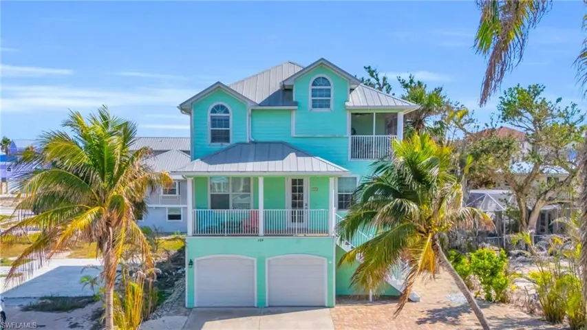 Beach home with a garage(Photo may be virtually enhanced)