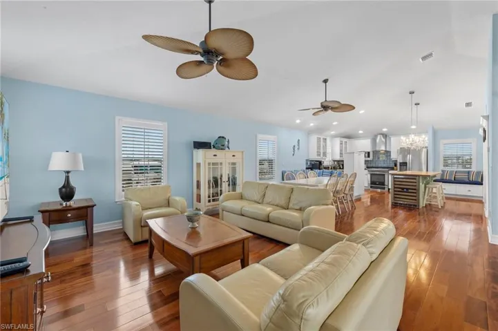 Large open space living, dining and kitchen areas! (Photo may be virtually enhanced)