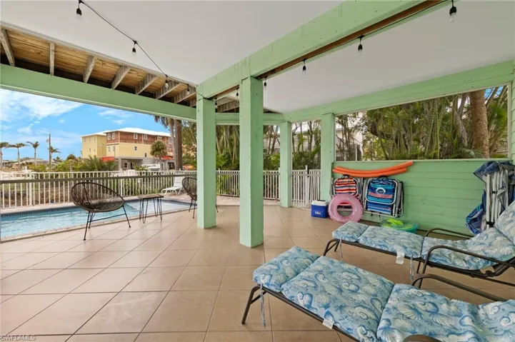 LARGE covered outdoor space for relaxing! (Photo may be virtually enhanced)