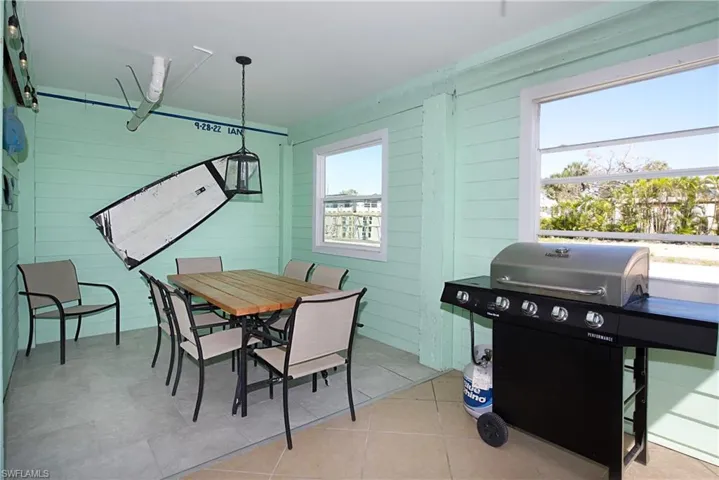 COVERED OUTDOOR dining area! (Photo may be virtually enhanced)