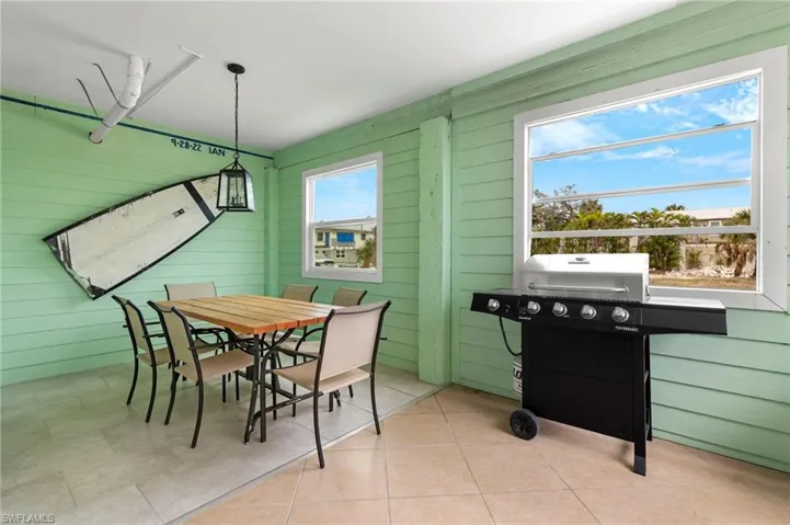 LARGE covered outdoor area for grilling and dining!(Photo may be virtually enhanced)