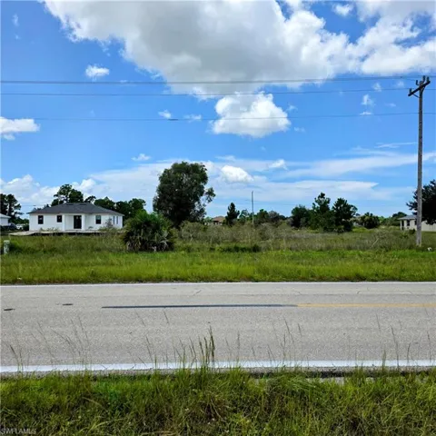 Expansive undeveloped land featuring natural vegetation and flat topography