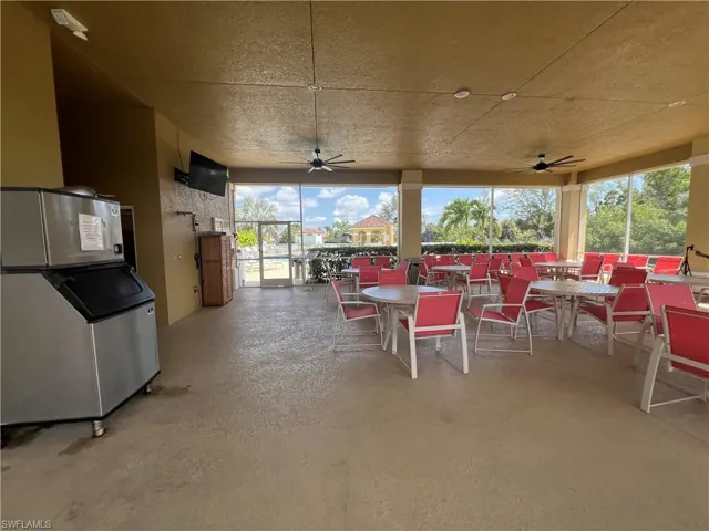View of patio / terrace featuring a ceiling fan and outdoor dining area
