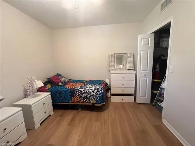 Bedroom with light wood-style flooring