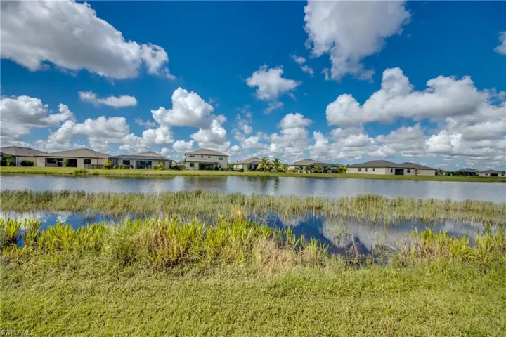 Water view with nearby suburban area