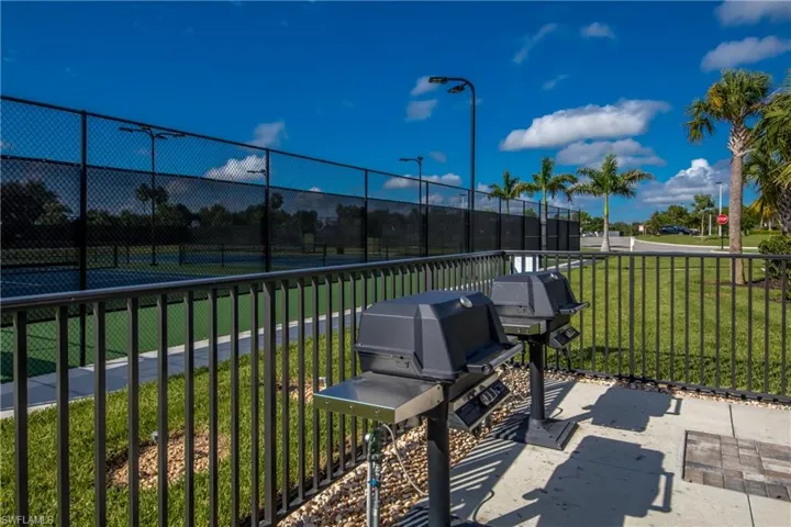 View of patio featuring a grill