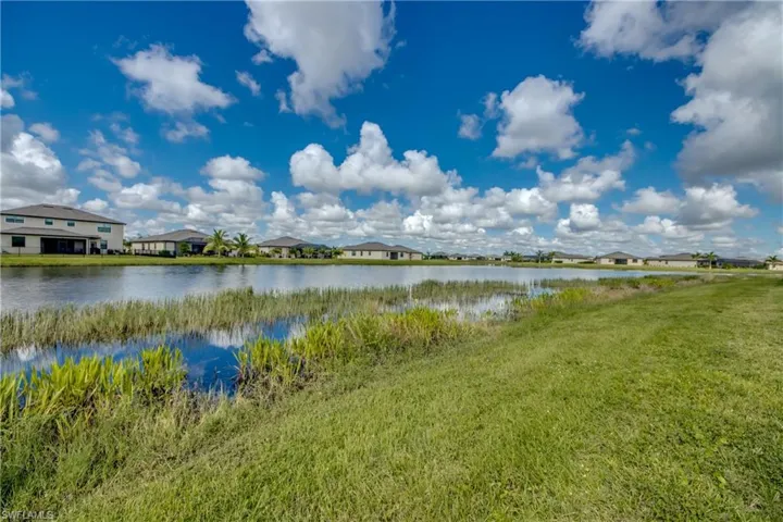 Water view featuring nearby suburban area