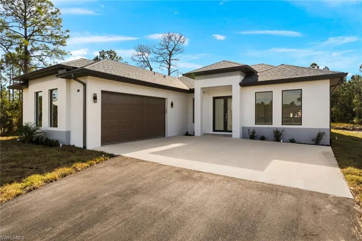 Prairie-style house with a garage