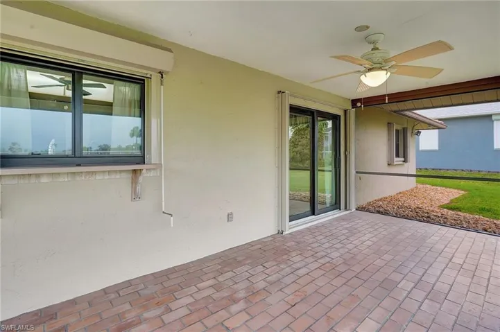 View of patio / terrace with ceiling fan