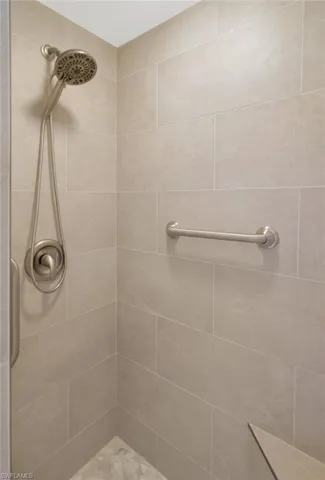 Bathroom featuring tiled shower