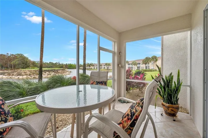 Sunroom featuring tile patterned flooring