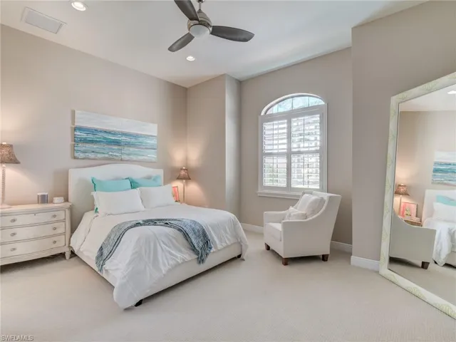 Guest Bedroom with carpet floors, recessed lighting, and a ceiling fan