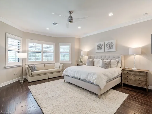 Bedroom featuring crown molding, ceiling fan, dark wood-style flooring, and recessed lighting