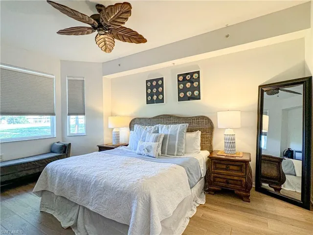 Bedroom featuring wood-type flooring and ceiling fan