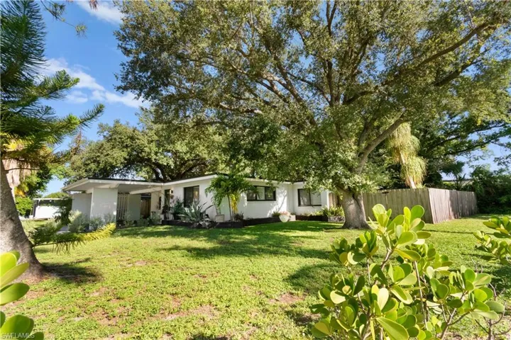 Conveniently located on an oversized corner lot off McGregor Blvd.
