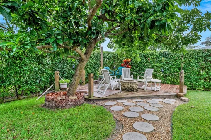 View of yard with a deck