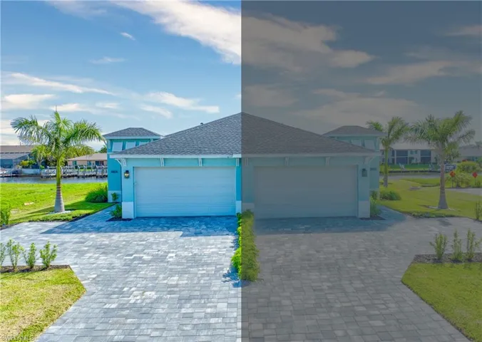 View of front facade featuring a front yard, decorative driveway, a garage, and roof with shingles
