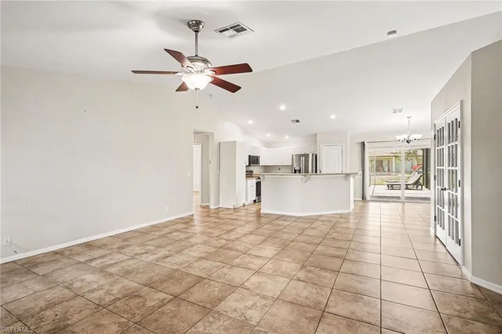 Split floor plan--primary bedroom suite on one side, den and guest bedrooms on opposite side