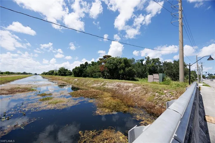 View of Ten Mile Canal next to commercial lot
