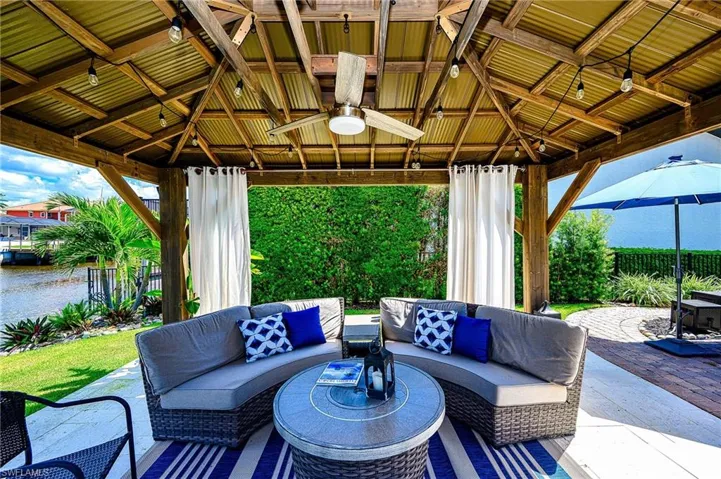 View of patio / terrace featuring outdoor lounge area, a gazebo, and ceiling fan