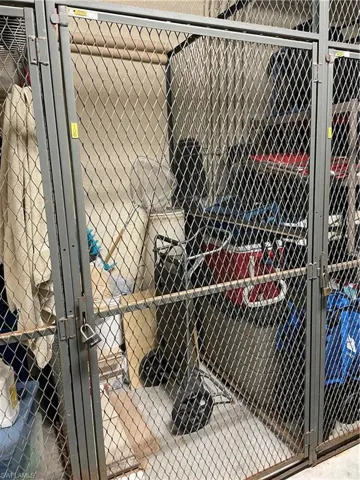 Ground floor behind elevator.