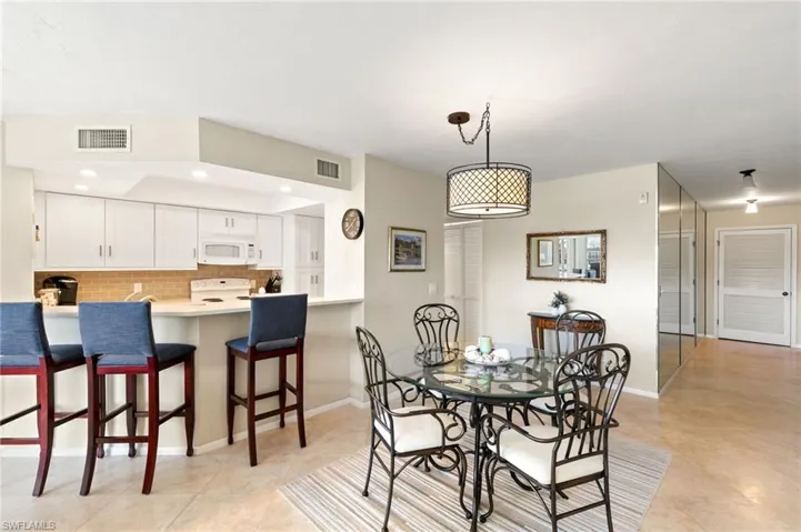 Tile in the dining, living, and kitchen