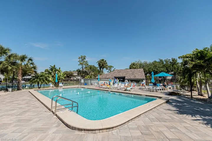 View of swimming pool with a patio