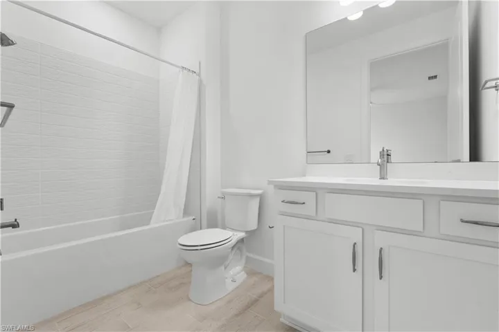 Guest bathroom with tub