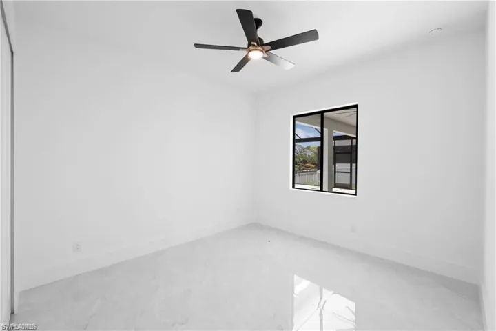 Unfurnished room with ceiling fan