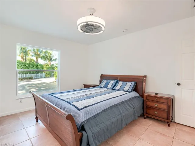 Large guest bedroom secluded behind your privacy hedge