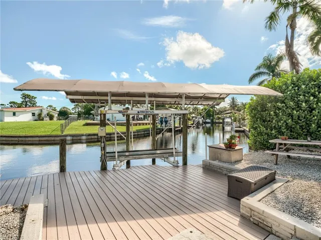 Located on a corner, the rear Dock view extends North thru East