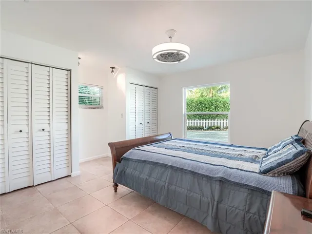 Large guest bedroom with dual closets