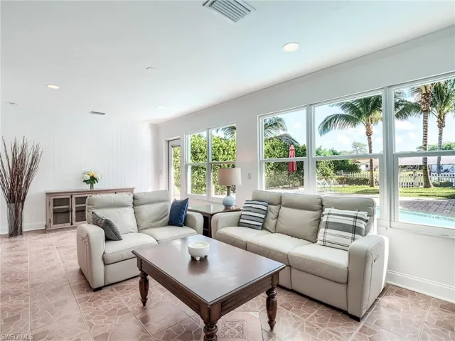 Rear facing living room looking at your beautiful private backyard oasis