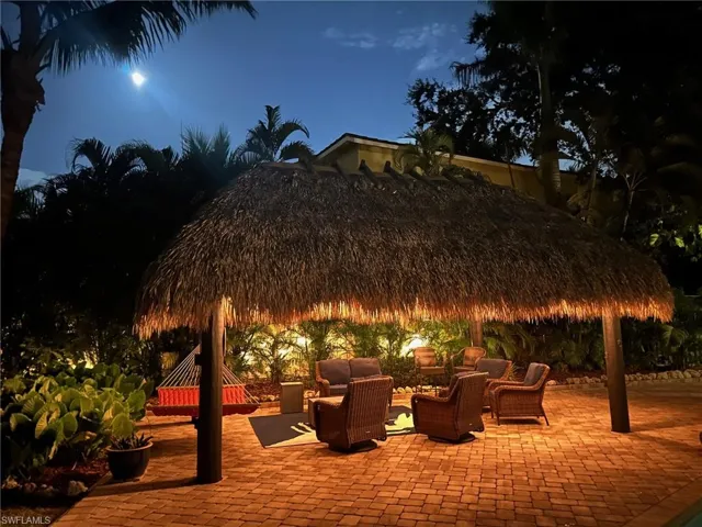 At night, the tiki hut offers a wonderful environment to entertain family and friends