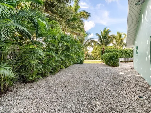 Side yard has tons of room for extra parking for all of your toys, trailers or even a large RV