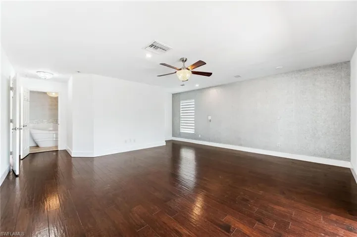 main bedroom with privacy blind closed.
