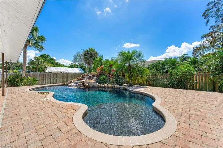 View of swimming pool featuring a fenced in pool, a patio, and a fenced backyard