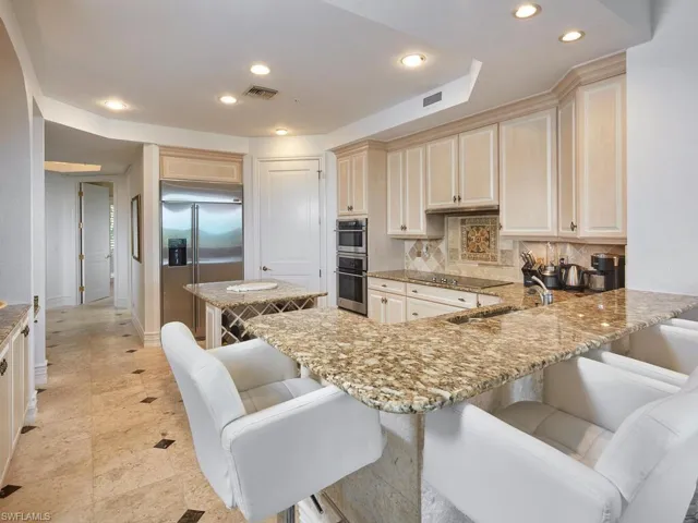 Food preparation or a morning cup of coffee the kitchen island is versatile.