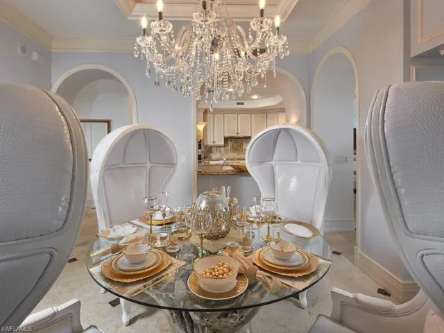 Enter through the foyer into this stately home.