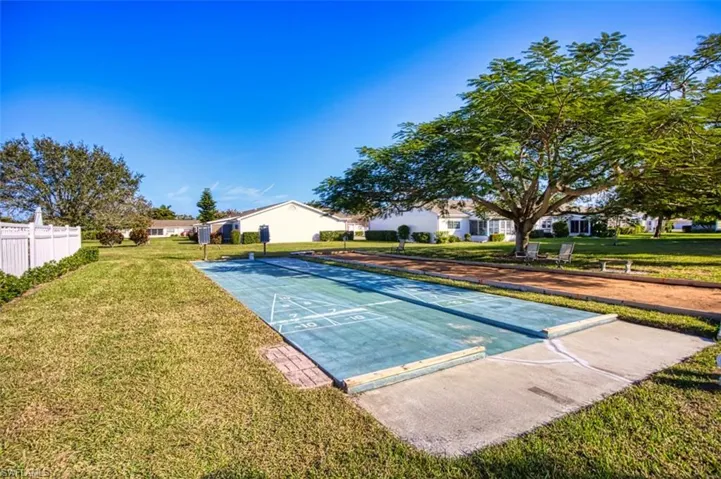 View of community featuring shuffleboard
