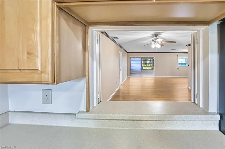 Corridor featuring ornamental molding