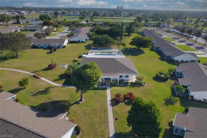 View of property location with nearby suburban area