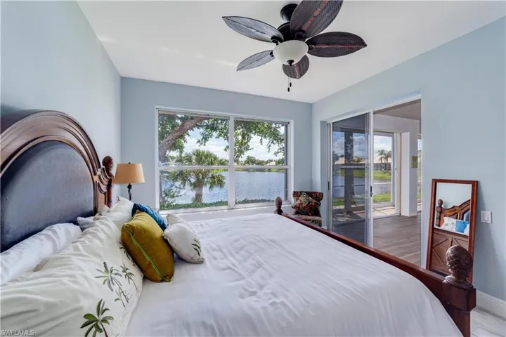 Primary Bedroom with Spectacular Lake View and Private Entry to Lanai.