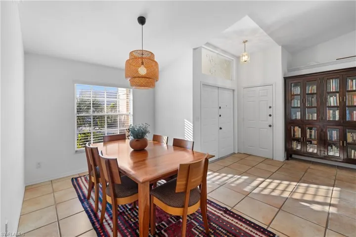 Dining room featuring light tile patterned floors