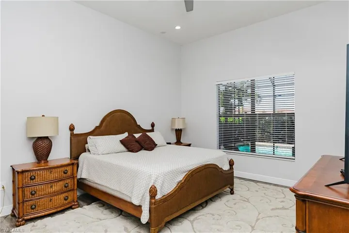 Bedroom featuring a ceiling fan and recessed lighting